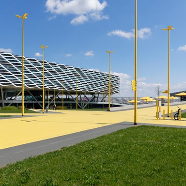 The photo shows the luminaire in a special version with a yellow coating